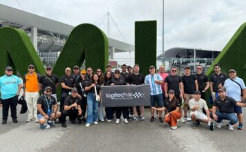 Gran Premio de Miami: El incentivo de Logitech para sus partners clave Grupo de ejecutivos de Logitech y partners posando en el Autódromo Internacional de Miami durante la Fórmula 1.